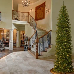 New National Tree Company 9 ft. Pre-Lit North Valley Spruce Pencil Slim Tree with Clear Lights
