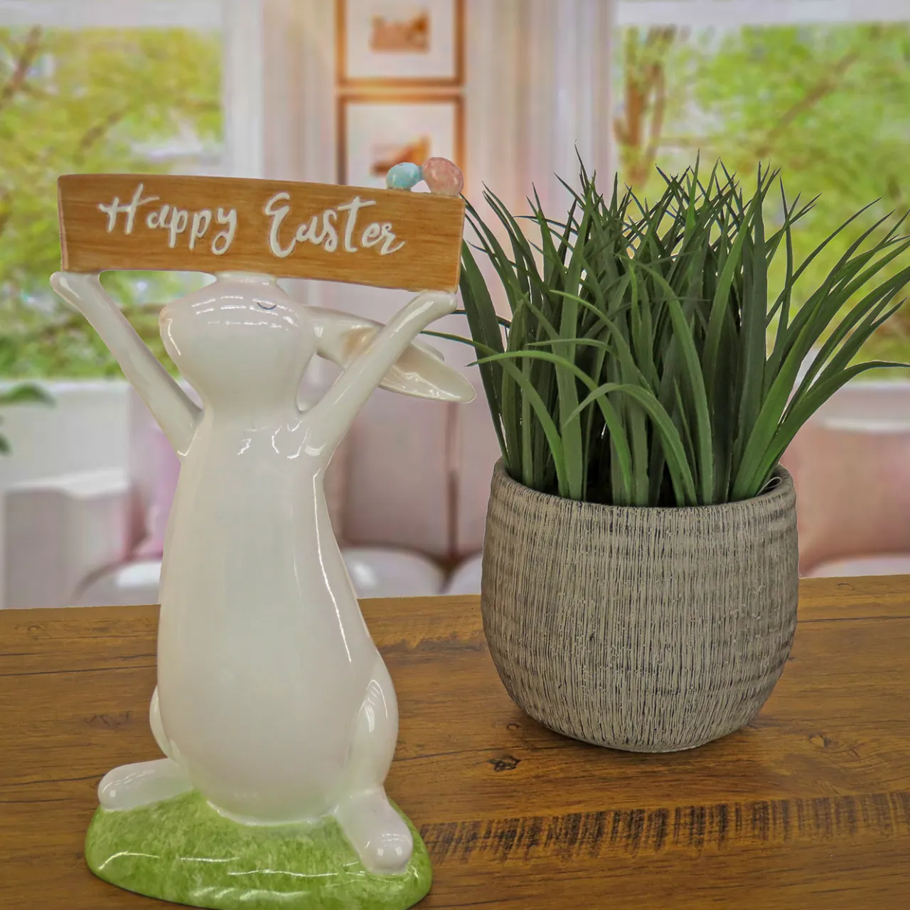 National Tree Company 11 in. Easter Bunny Figure Holding "Happy Easter" Sign Table Decoration