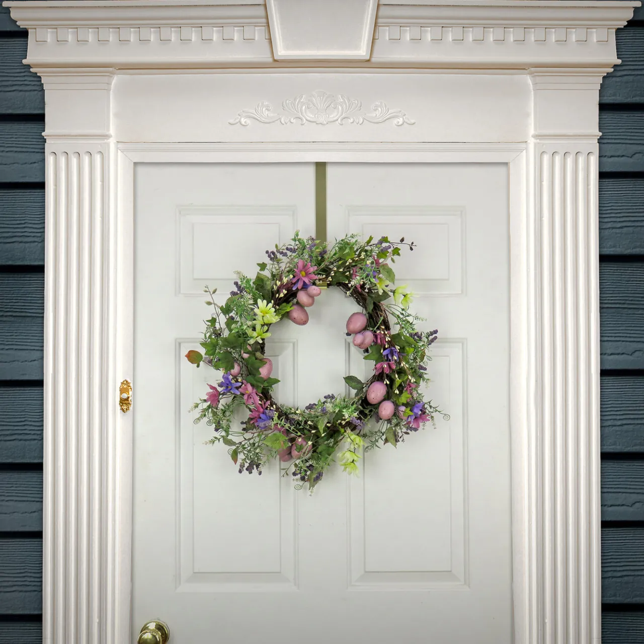 Hot National Tree Company 22 in. Easter Wreath Decorated with Purple Pastel Eggs, Pink Flowers, Leafy Greens