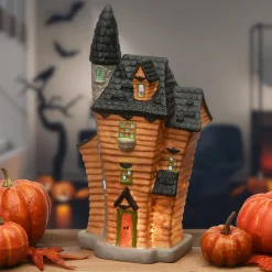 New National Tree Company 12 in. Halloween Pre-Lit Black Haunted House Decoration with LED Lights