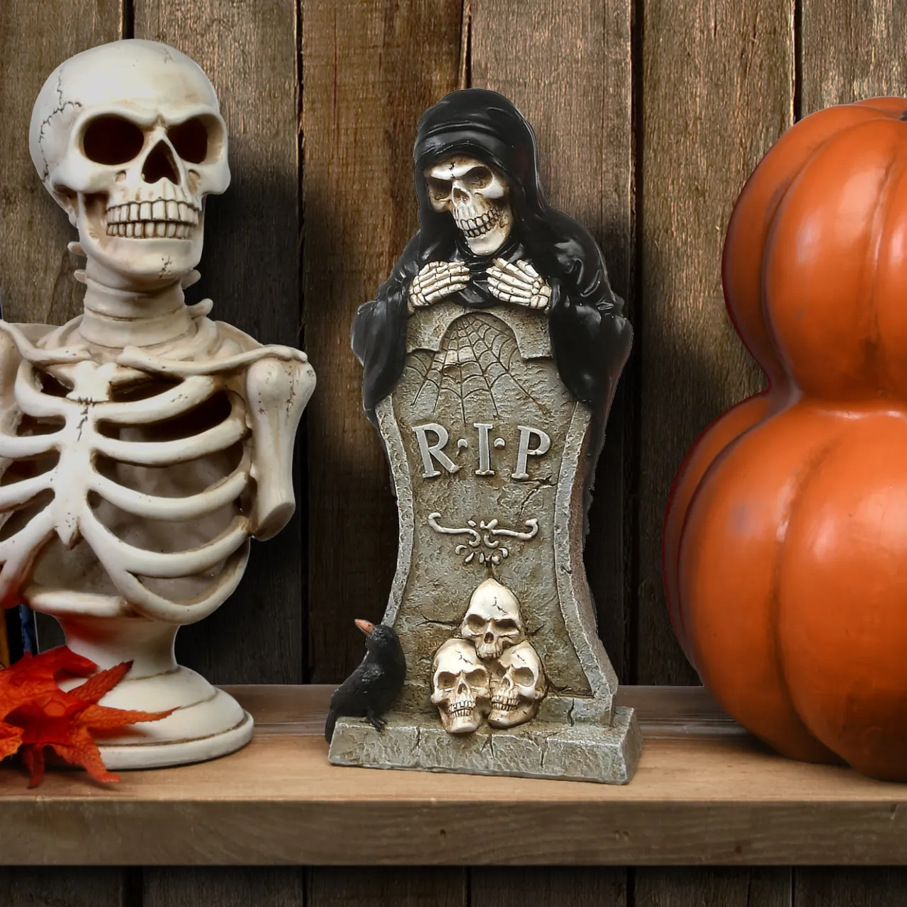 Discount National Tree Company 12 in. Halloween Skeleton Behind a Tombstone Decoration