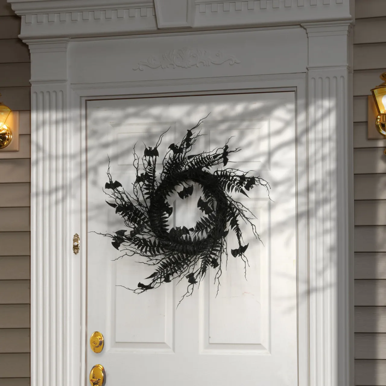 National Tree Company 24 in. Halloween Spooky Wreath with Bats, Fern Leaves, Branches