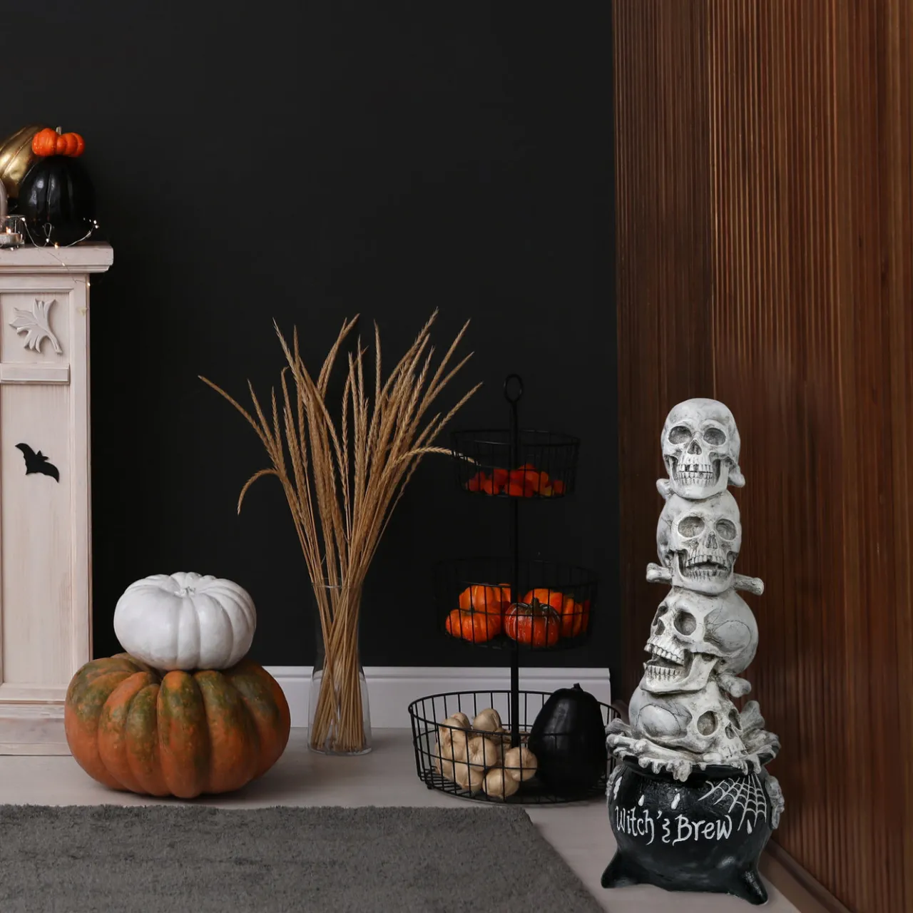 Discount National Tree Company 38 in. Halloween Stacked Skulls in a Cauldron Tabletop Decoration