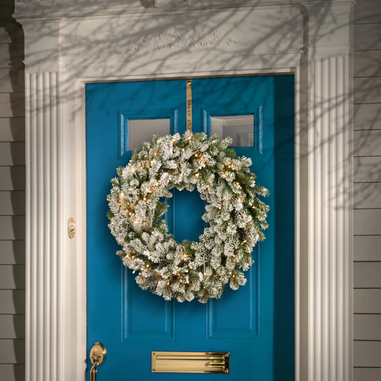 Outlet National Tree Company 24 in. Pre-Lit Snowy Sheffield Spruce Wreath with Twinkly LED Lights
