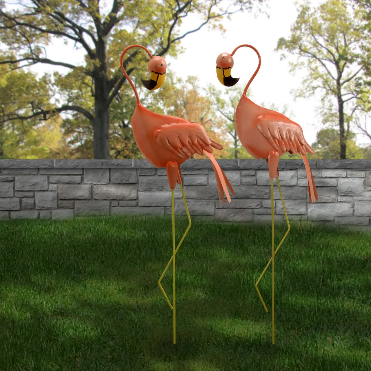 National Tree Company 34 in. Resting Peach Flamingo Metal Lawn Decoration